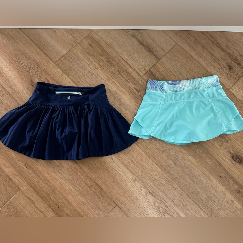 Athleta girls skirt/skort. Navy blue skirt and teal skirt. Smoke free.